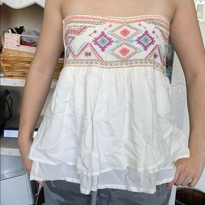Strapless expandable top also worn as a skirt